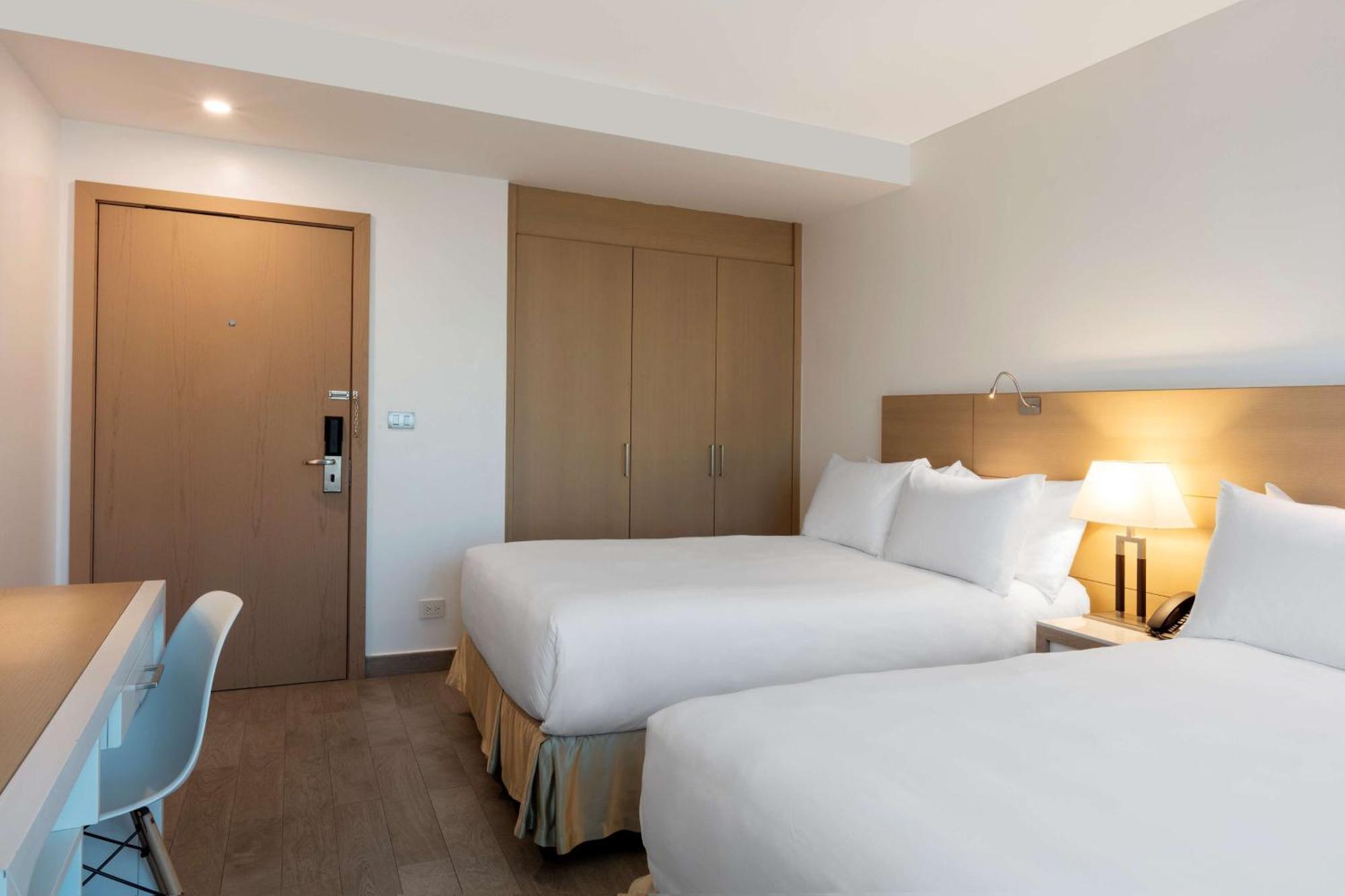 Deluxe Double Room with Two Double Beds and City View